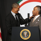 President Barack Obama greets Al Sharpton at the 16th annual NAN convention at the Sheraton New York Times Square, April 11, 2014 (John Moore/Getty Images)